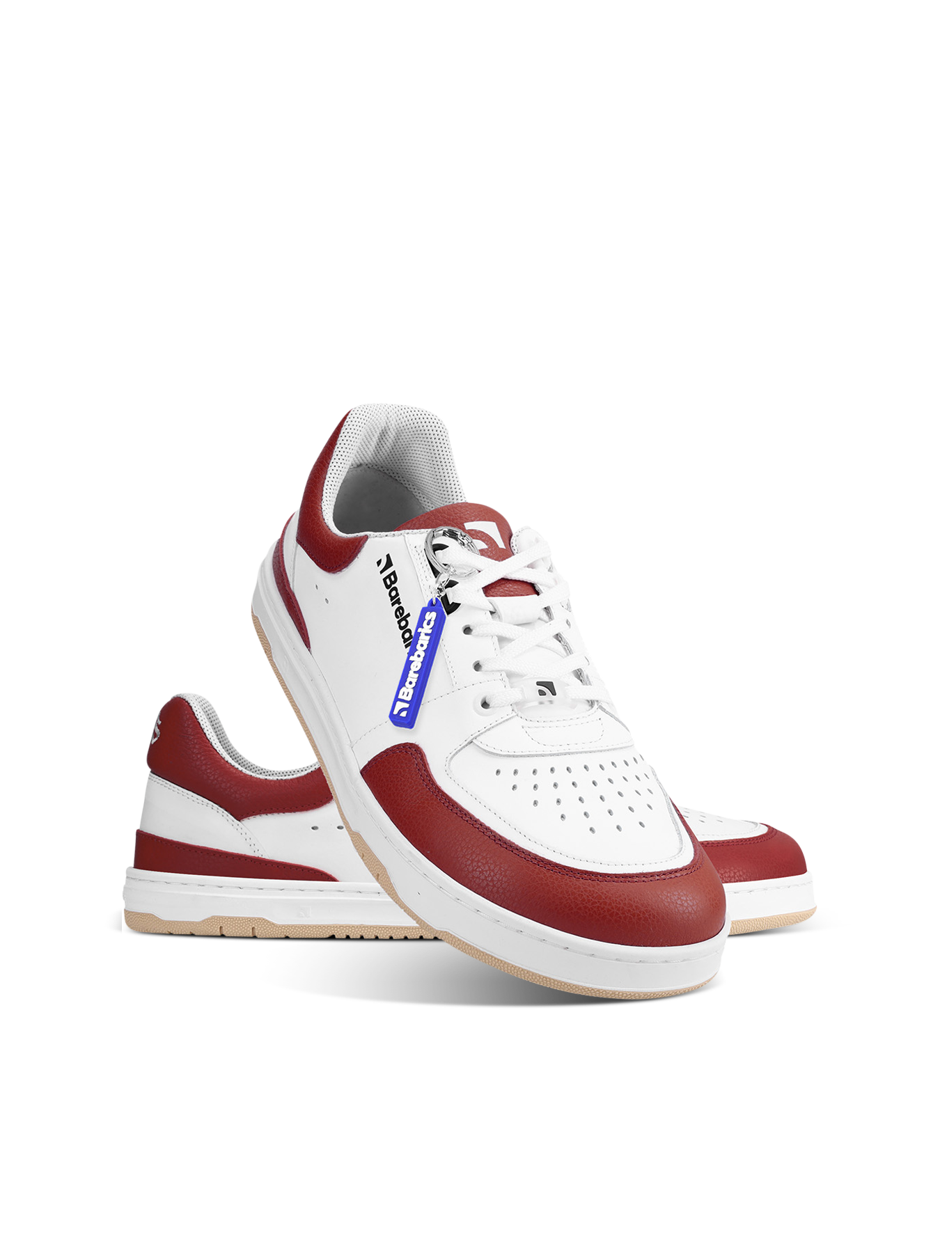 Barefoot tenisky Barebarics Wave - White & Crimson Red.
  Zvršok sa skladá z kvalitnej hladkej kože nappa; Ide o materiál, ktorý má výbornú odolnosť voči vlhkosti a ľahko sa ošetruje  Podšívka je vyrobená z technickej textílie Dermodry Coolmax®, ktorá zabezpečuje kontinuálny odvod vlhkosti; Tento typ podšívky urýchľuje proces odvodu a absorpcie potu, vďaka čomu ostáva koža suchá; Zároveň ide o mäkký, ľahký a priedušný materiál, ktorý sa používa pri výrobe prestížnych modelov obuvi a prechádza najnáročnejšími skúškami technickej kvality v nezávislých laboratóriach  Podošva je zhotovená z jemnej syntetickej gumy s vysokou odolnosťou voči opotrebeniu; Podošva Retro je inšpirovaná umením a pouličnými športami z konca 20.
Barefoot vlastnosti
  Anatomický tvar - Teniska rešpektuje tvar chodidiel.
Viac info
  vychádzková obuv  moderný mestský dizajn  navrhnuté a ručne vyrobené v Európskej únii, z lokálnych udržateľných materiálov  vynikajúca odolnosť a farebná stálosť materiálov  technológia Dermodry Coolmax® pre kontinuálny odvod vlhkosti  dostupné v číslach: 36-47 (podľa európskeho merania)EAN/SKU: %eanorsku%